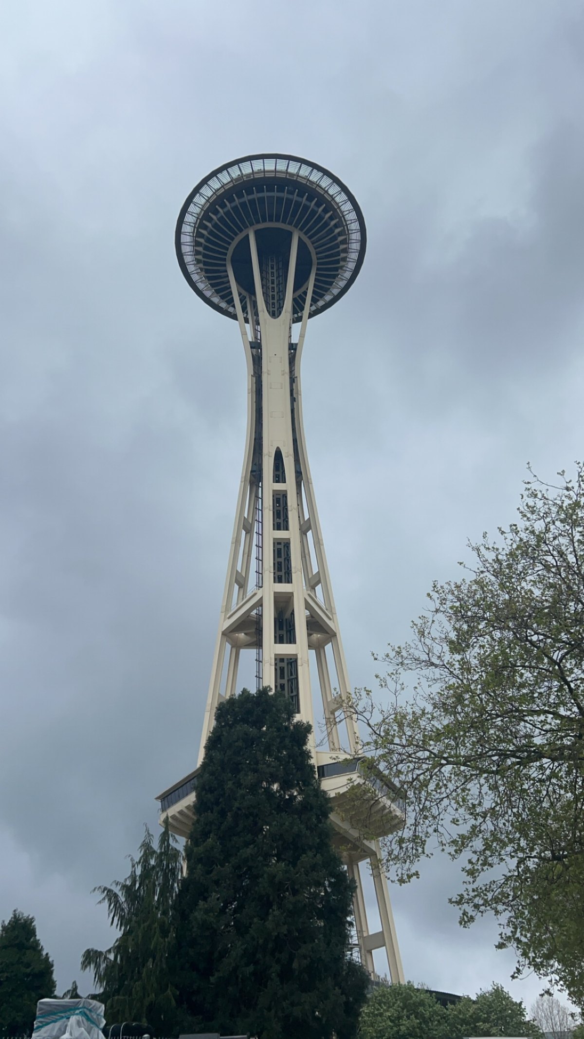 The Space Needle rising over downtown Seattle on an overcast spring afternoon